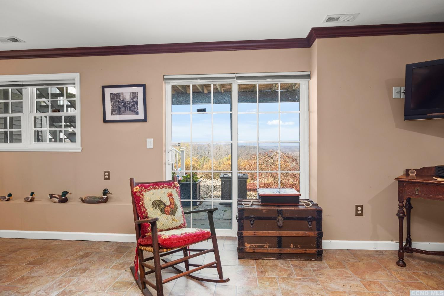 17 Academy Hill Drive Hudson, NY 12534 - Photo 25 of 35 a living room with furniture and a flat screen tv