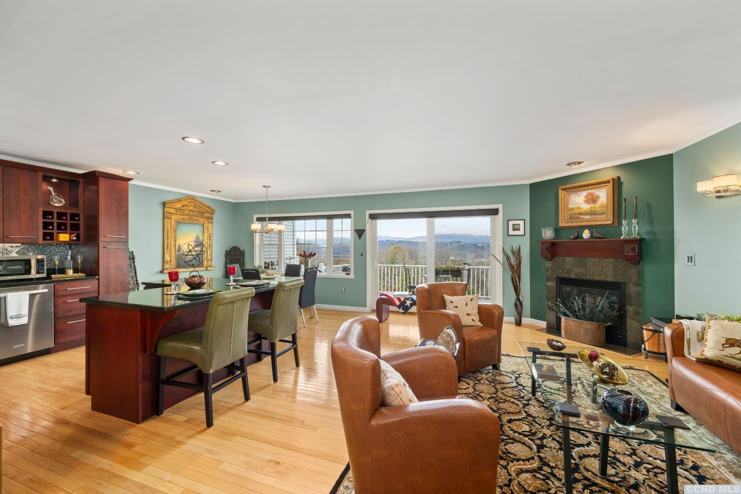 17 Academy Hill Drive Hudson, NY 12534 - Photo 4 of 35 a living room with fireplace furniture and a large window