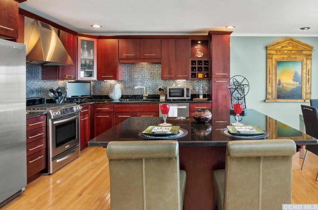 17 Academy Hill Drive Hudson, NY 12534 - Photo 10 of 35 a kitchen with stainless steel appliances granite countertop a sink stove and cabinets