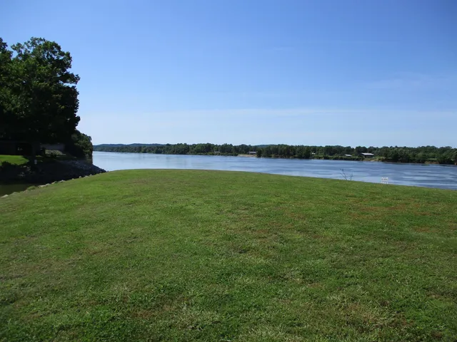 a view of a lake and a yard