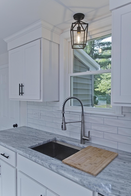 178 Palmer Road Monson, MA 01057 - Photo 13 of 30 a kitchen with a sink cabinets and window