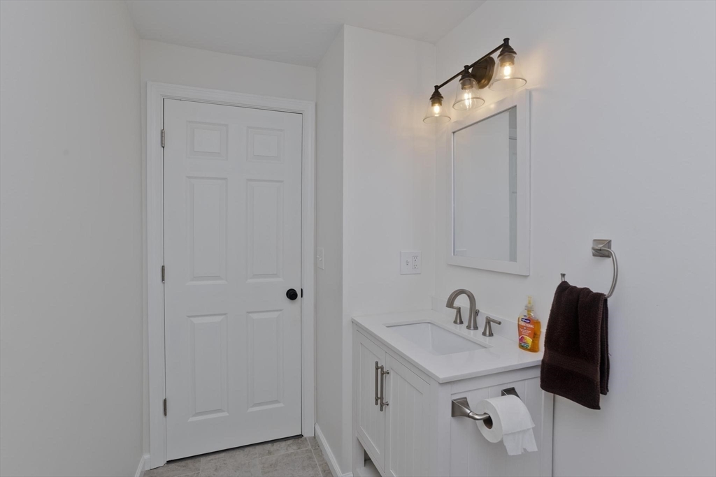 178 Palmer Road Monson, MA 01057 - Photo 22 of 30 a bathroom with a sink and a mirror