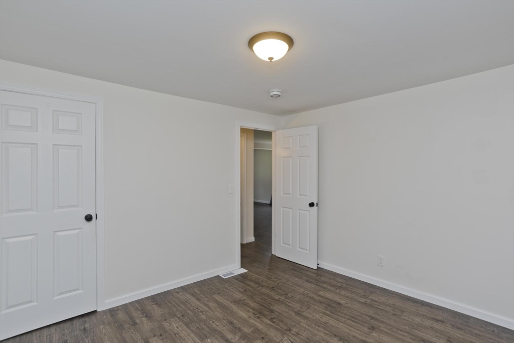 178 Palmer Road Monson, MA 01057 - Photo 26 of 30 a view of an empty room with wooden floor