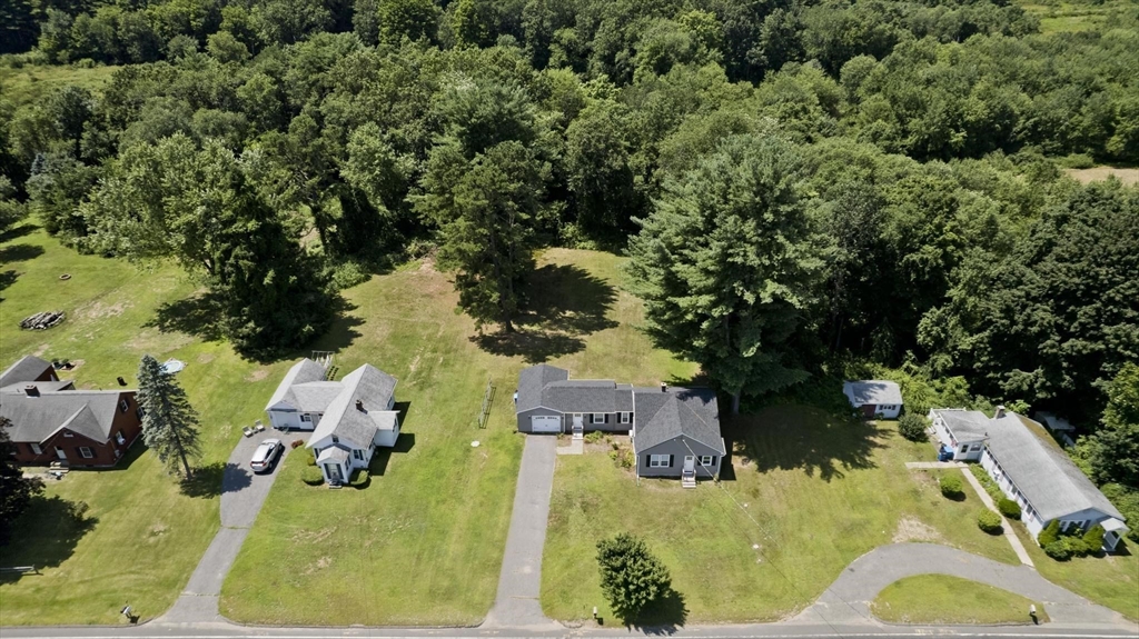 178 Palmer Road Monson, MA 01057 - Photo 4 of 30 an aerial view of a house with a yard swimming pool and outdoor seating