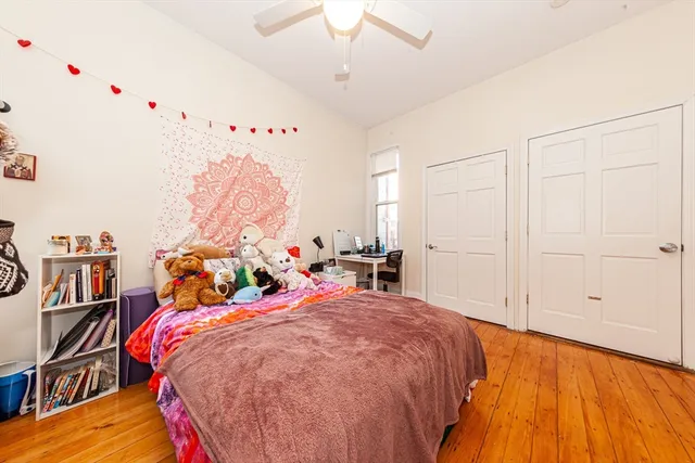 a bed room with a bed and a bed