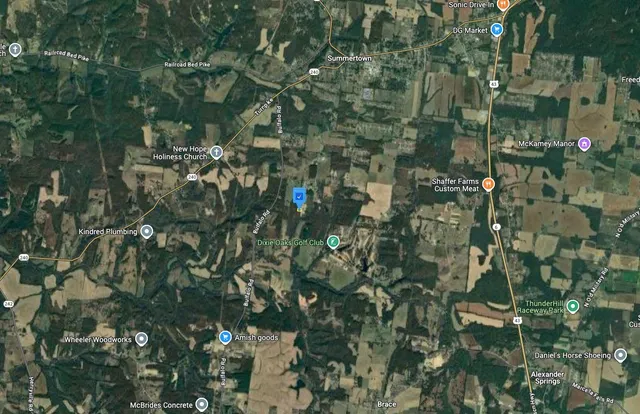 a bathroom with a shower and a sink