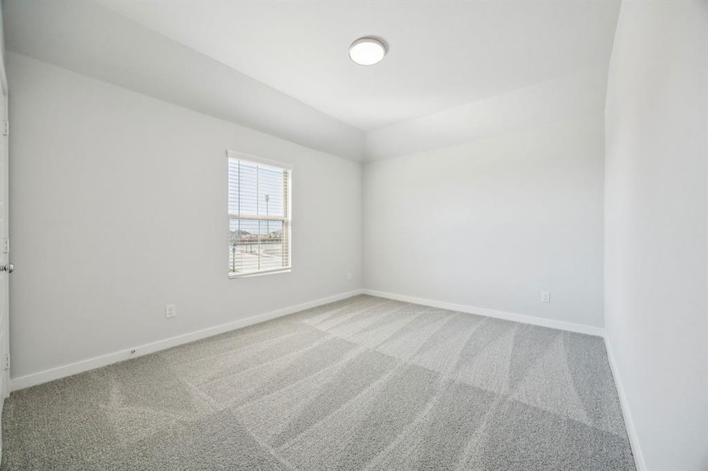 9501 Rattlesnake Trail Crowley, TX 76036 - Photo 28 of 36 an empty room with a window