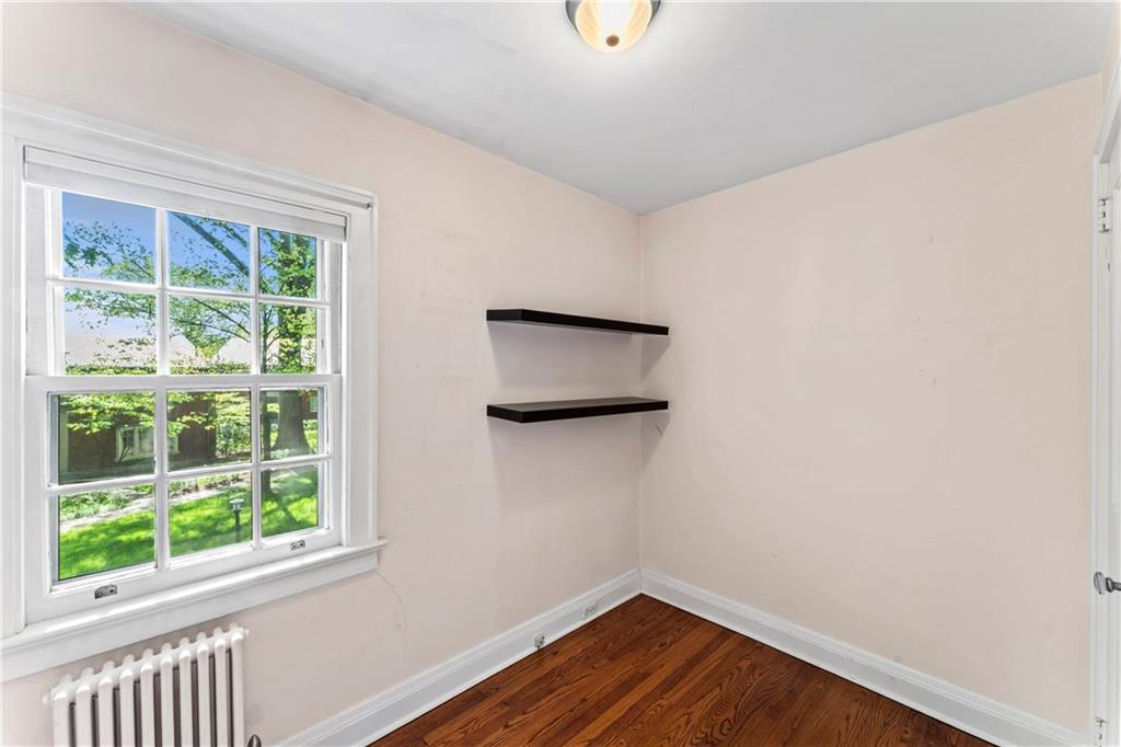 440 Olympia Road Pittsburgh, PA 15211 - Photo 13 of 25 a view of a small space with wooden floor and a window