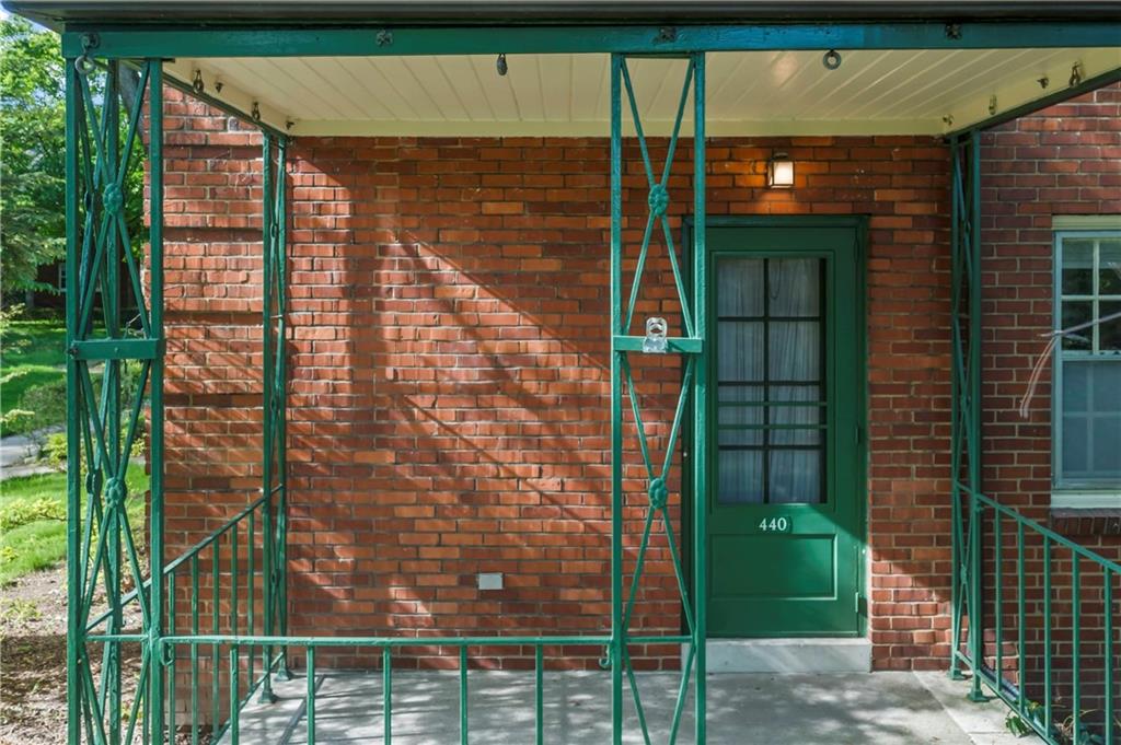 440 Olympia Road Pittsburgh, PA 15211 - Photo 2 of 25 a view of a brick house with a street from a room