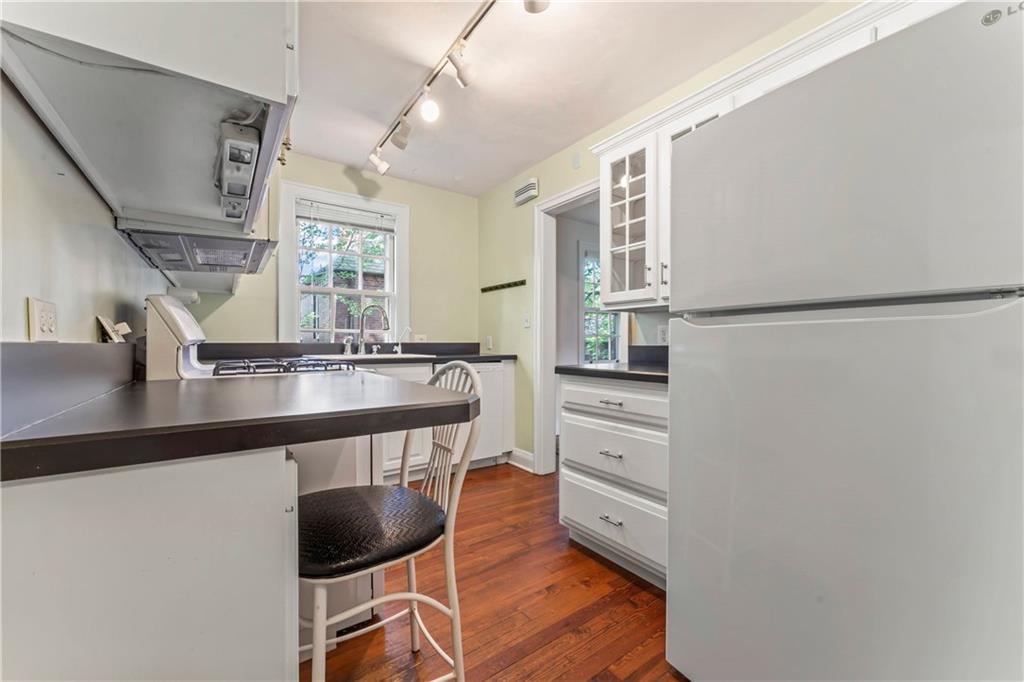 440 Olympia Road Pittsburgh, PA 15211 - Photo 7 of 25 a kitchen with stainless steel appliances a refrigerator and a sink