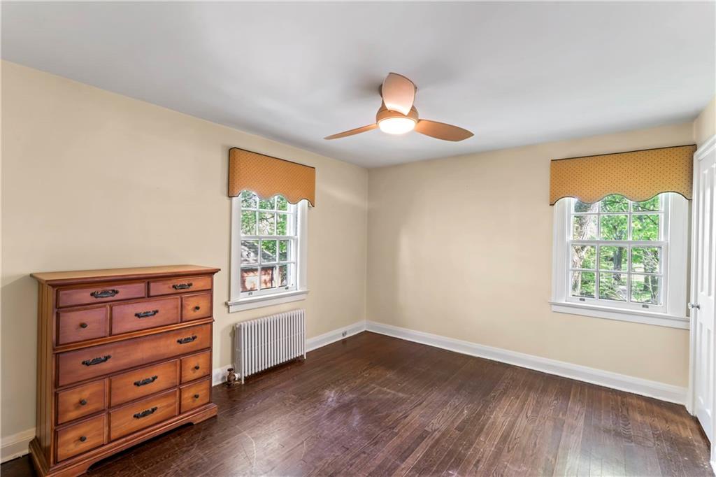 440 Olympia Road Pittsburgh, PA 15211 - Photo 9 of 25 wooden floor in an empty room with a window