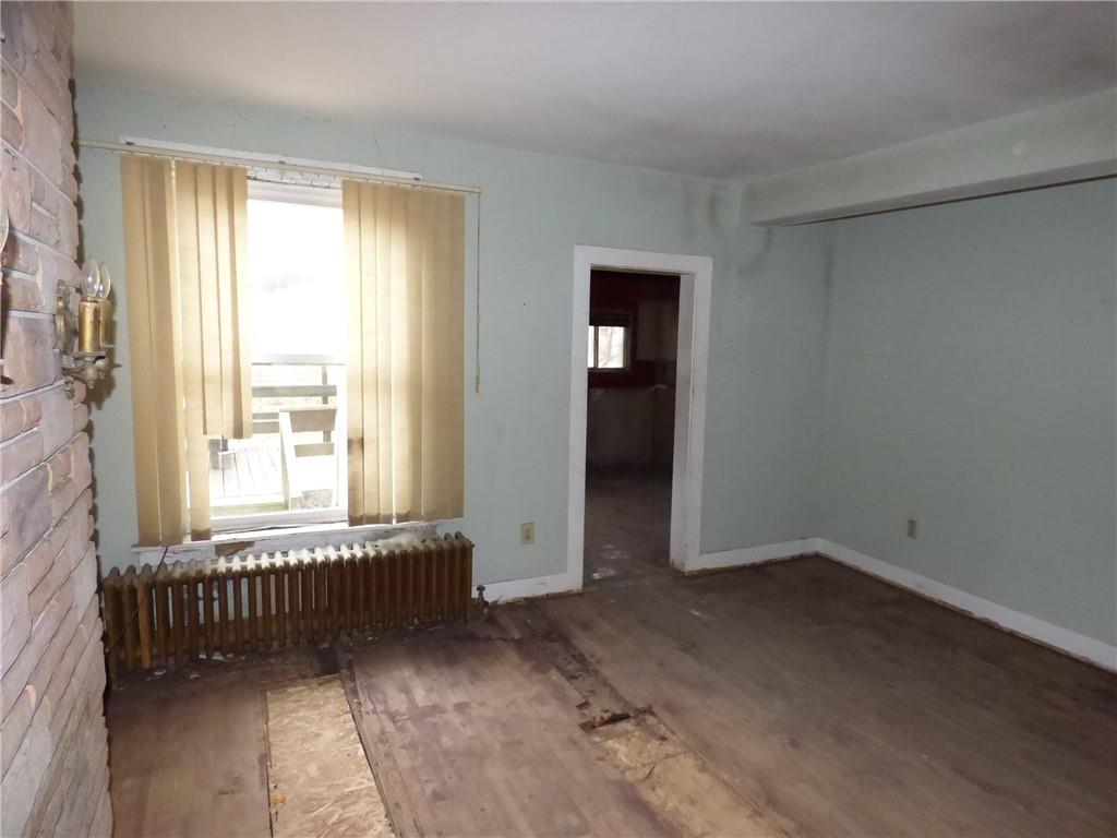 211 Amherst Street Pittsburgh, PA 15220 - Photo 17 of 40 a view of an empty room with a window