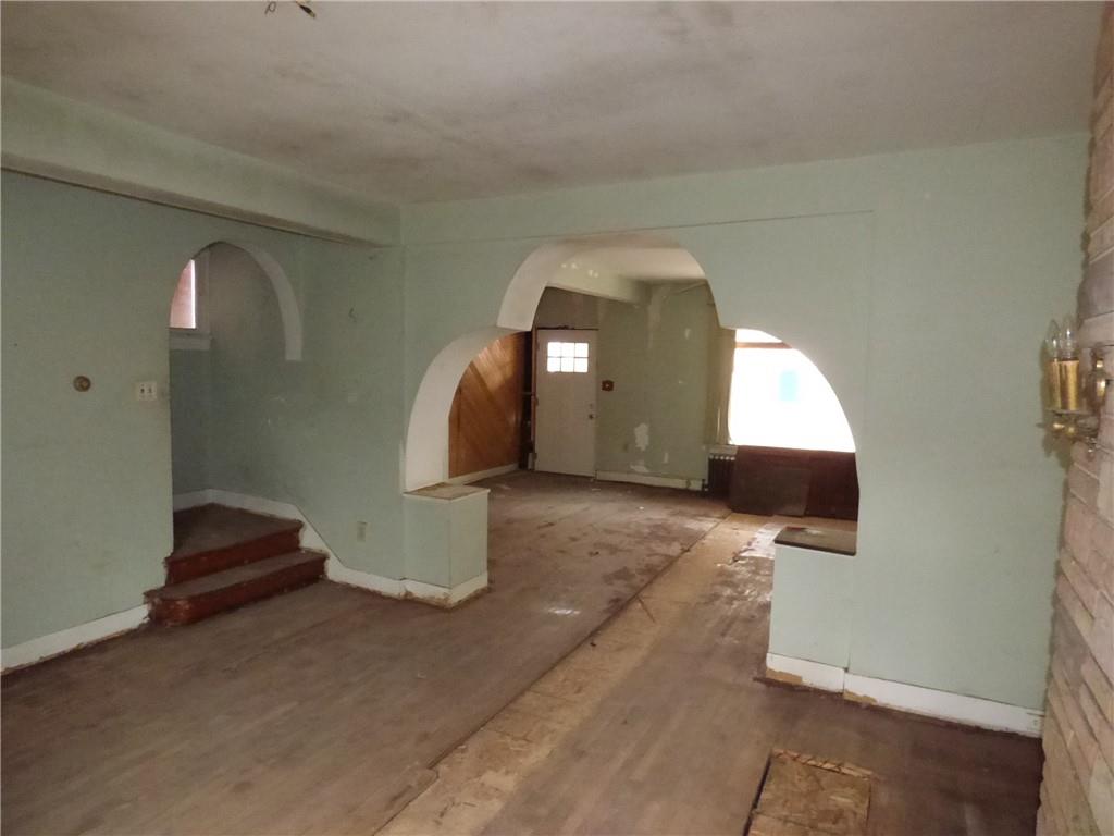 211 Amherst Street Pittsburgh, PA 15220 - Photo 19 of 40 a view of a livingroom with wooden floor and furniture