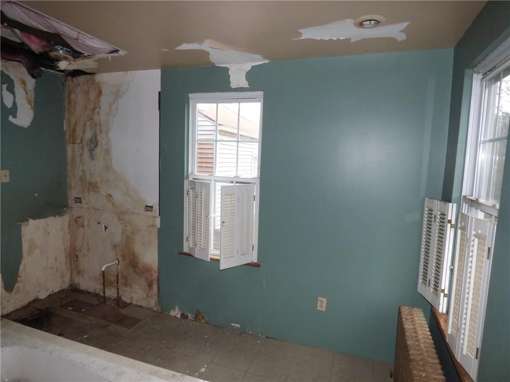 211 Amherst Street Pittsburgh, PA 15220 - Photo 31 of 40 a bathroom with a sink and a mirror