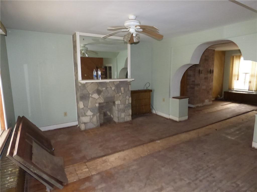 211 Amherst Street Pittsburgh, PA 15220 - Photo 8 of 40 a view of a livingroom with a staircase