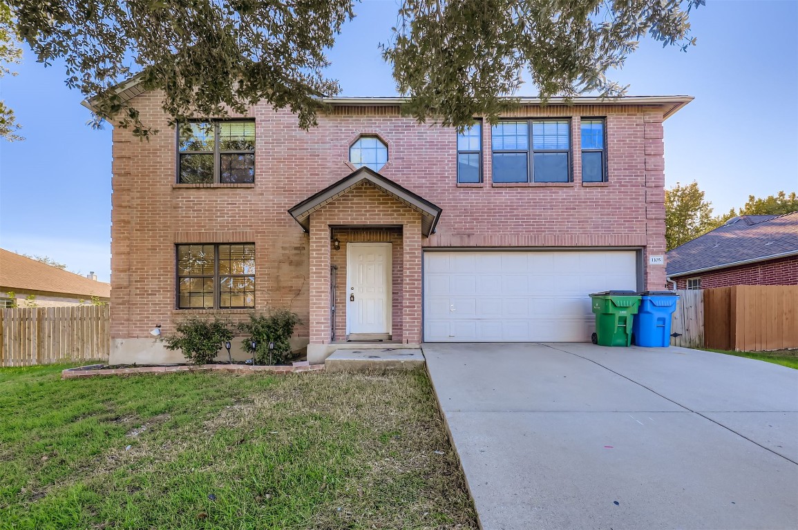 1105 American Robin Path Pflugerville, TX 78660 - Photo 2 of 32 a front view of a house with garden