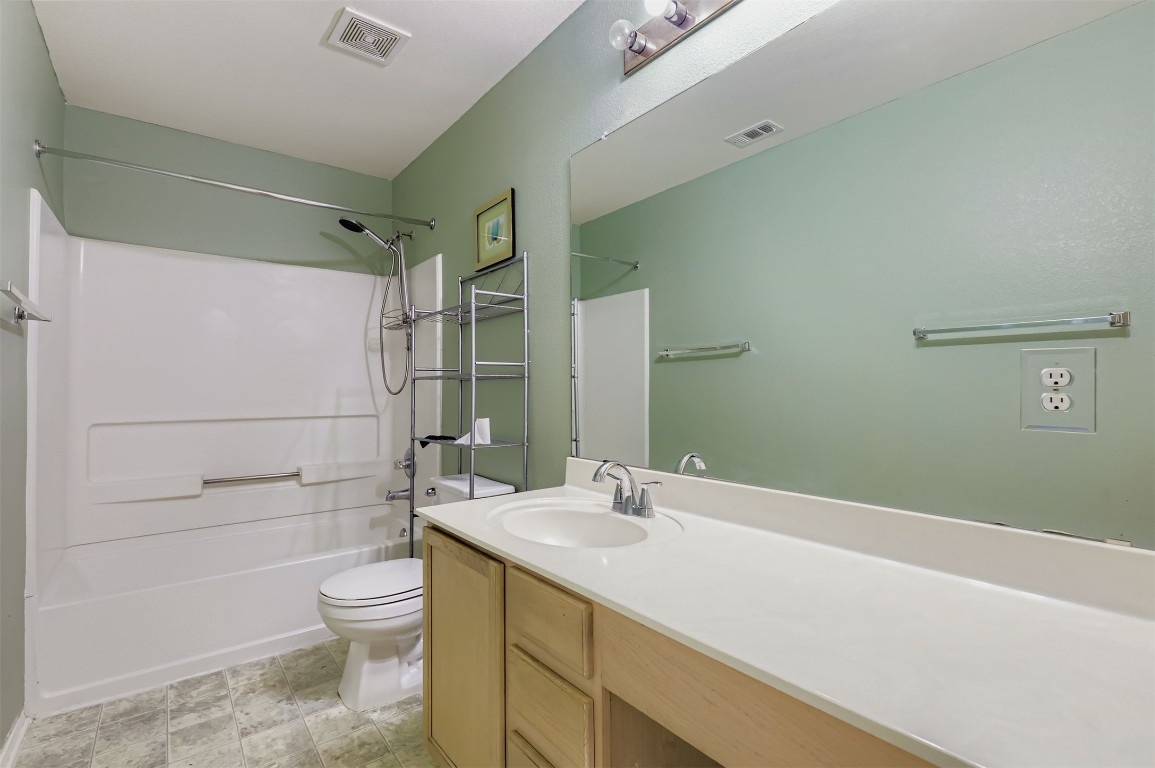 1105 American Robin Path Pflugerville, TX 78660 - Photo 22 of 32 a bathroom with a sink toilet and shower