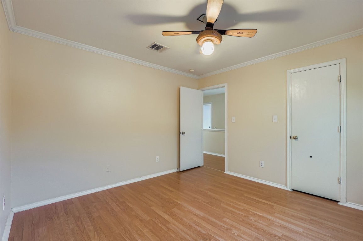 1105 American Robin Path Pflugerville, TX 78660 - Photo 24 of 32 wooden floor in an empty room