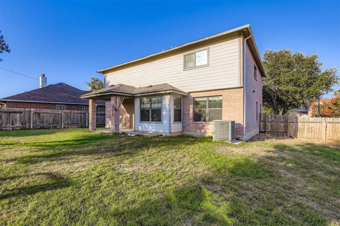 1105 American Robin Path Pflugerville, TX 78660 - Photo 28 of 32 a view of a house with a yard