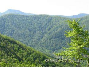 Lot#3 Bent Tree Road Maggie Valley, NC 28751 - Photo 9 of 12 a view of a field with mountains in the background