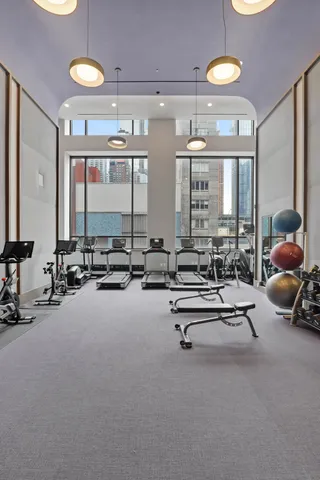 a lobby with furniture and window