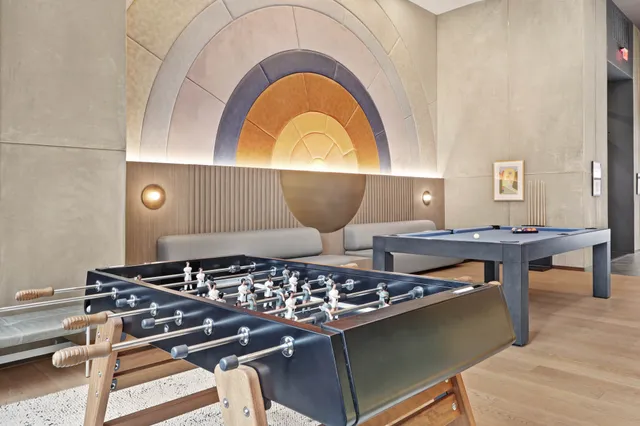 a stove top oven sitting next to a window