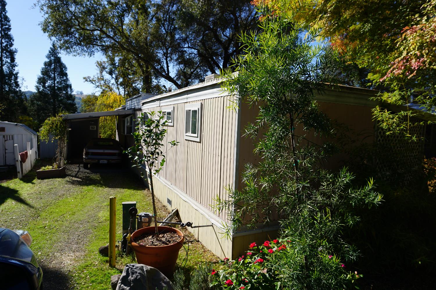 1525 Cold Springs Road, Unit 92 Placerville, CA 95667 - Photo 12 of 12 a backyard of a house with lots of green space