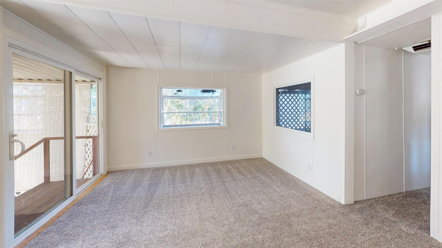 1525 Cold Springs Road, Unit 92 Placerville, CA 95667 - Photo 5 of 12 an empty room with windows