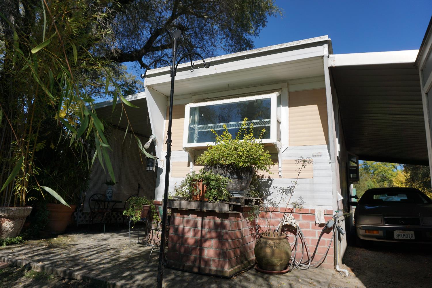 1525 Cold Springs Road, Unit 92 Placerville, CA 95667 - Photo 8 of 12 a view of a house with backyard and sitting area