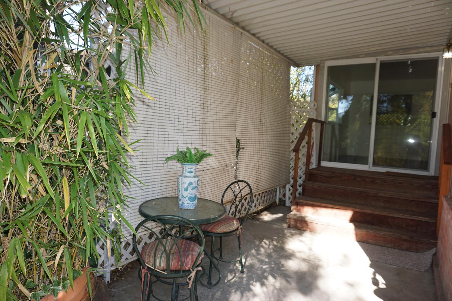 1525 Cold Springs Road, Unit 92 Placerville, CA 95667 - Photo 9 of 12 a table and chairs in a patio