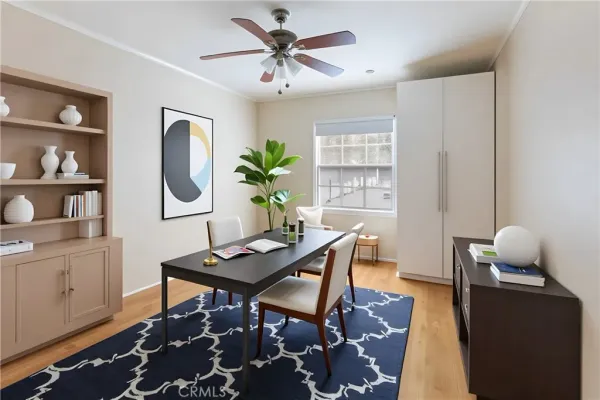 a work room with furniture and wooden floor