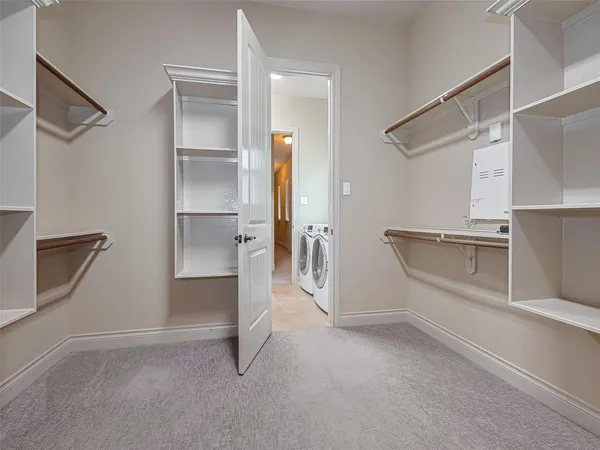 a view of an empty walk in closet