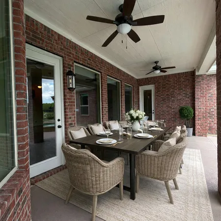 a view of a backyard with plants and garden