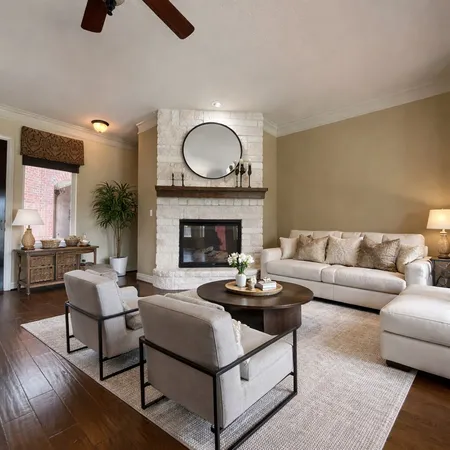 a living room with furniture and a fireplace