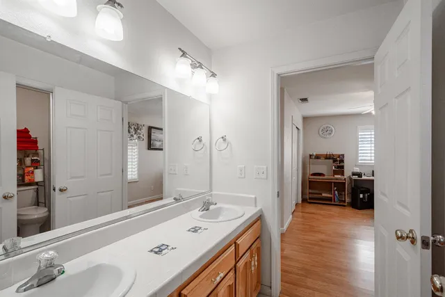 a view of a livingroom with furniture and a window
