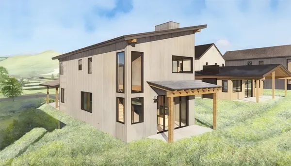 an aerial view of residential houses and street