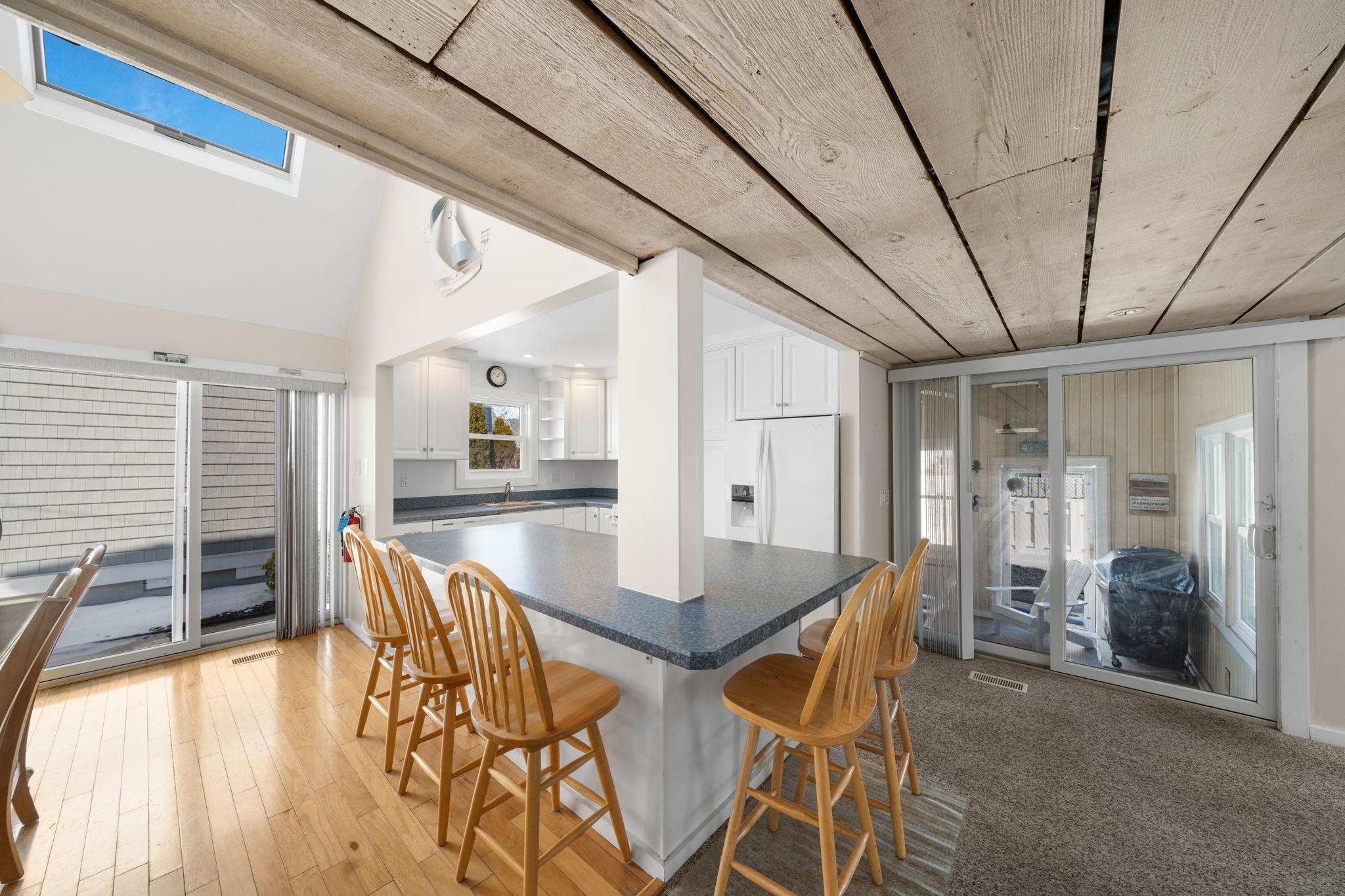 45 19th Street Avalon, NJ 08202 - Photo 14 of 50 a dining room with furniture and wooden floor
