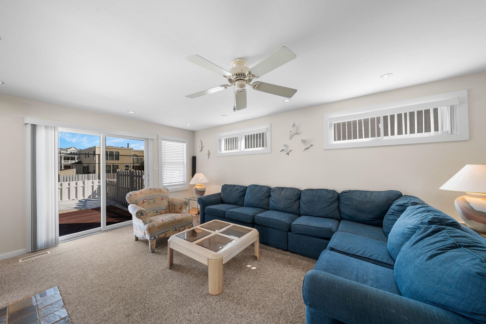 45 19th Street Avalon, NJ 08202 - Photo 15 of 50 a living room with furniture and a window