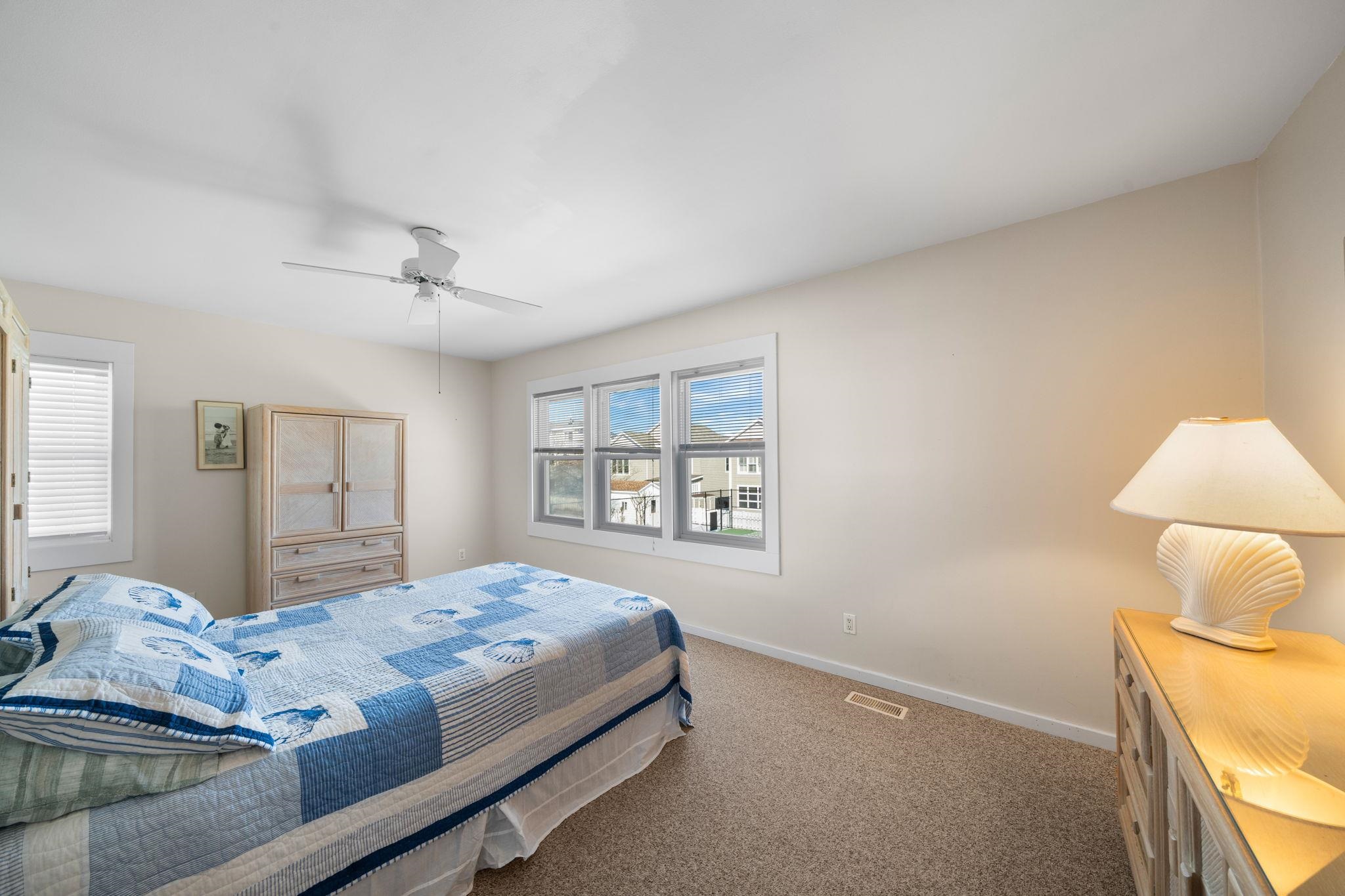 45 19th Street Avalon, NJ 08202 - Photo 24 of 50 a bedroom with a bed and a window