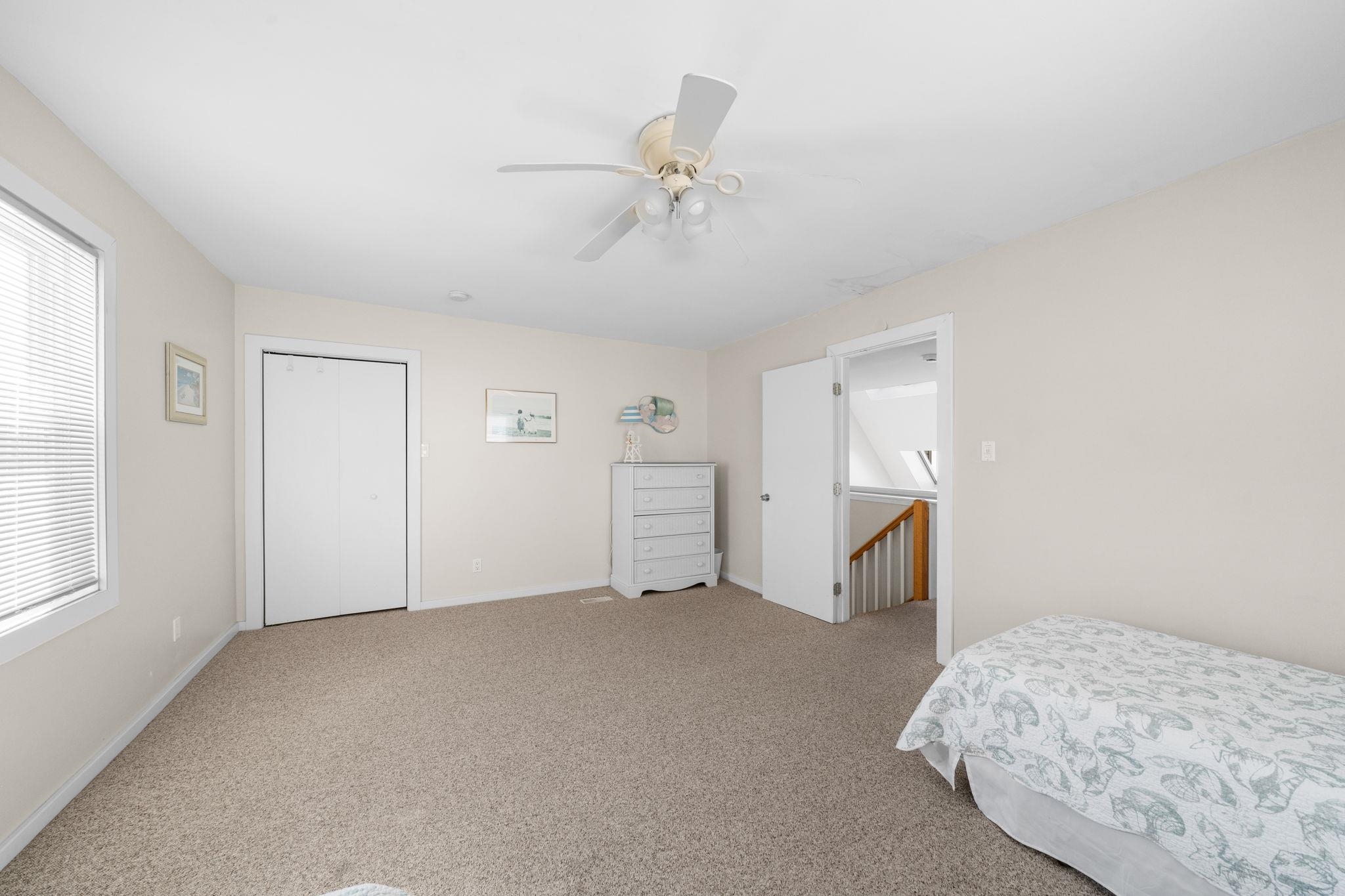 45 19th Street Avalon, NJ 08202 - Photo 30 of 50 a view of a livingroom with a ceiling fan and window
