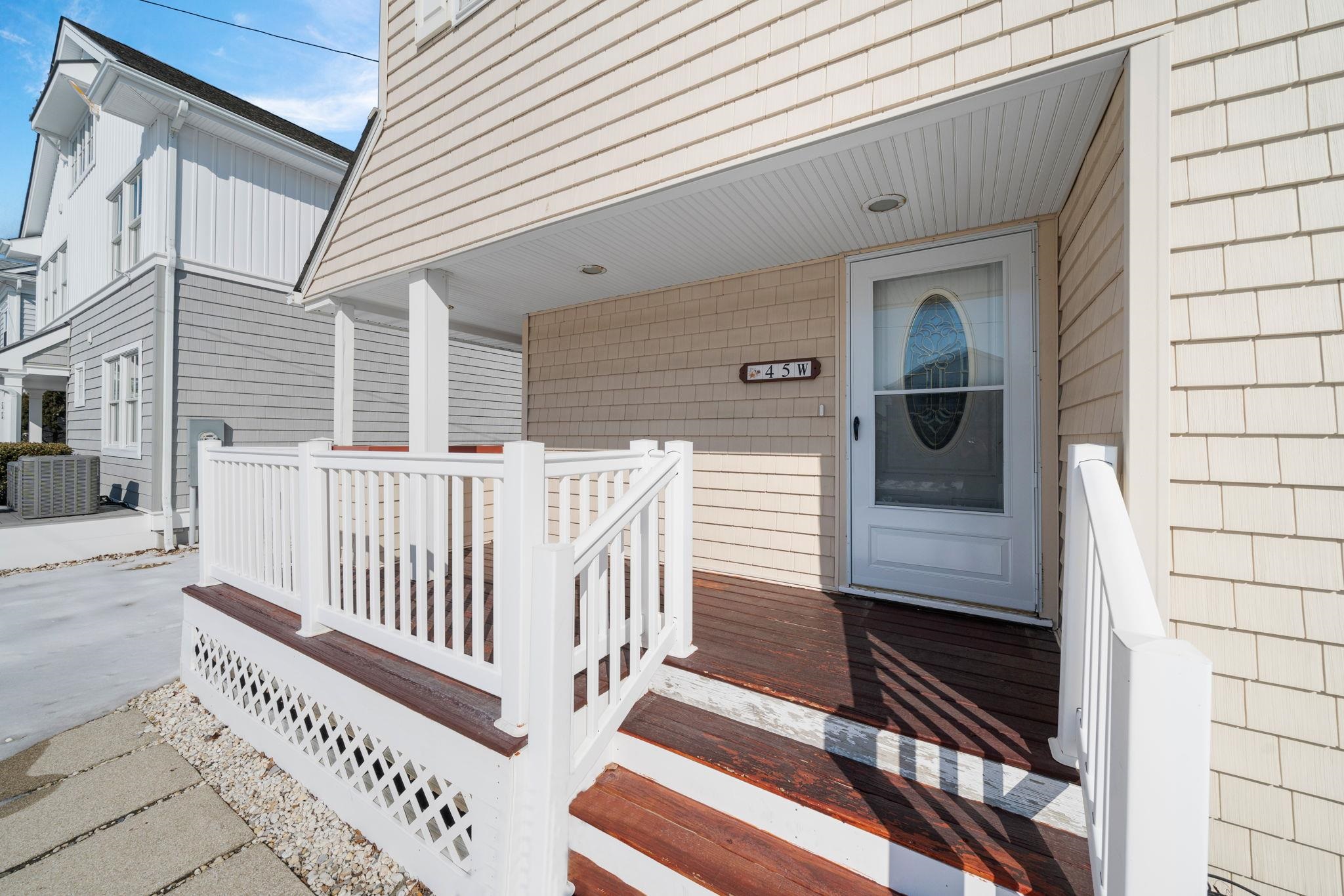 45 19th Street Avalon, NJ 08202 - Photo 3 of 50 a view of a house with wooden floor and fence