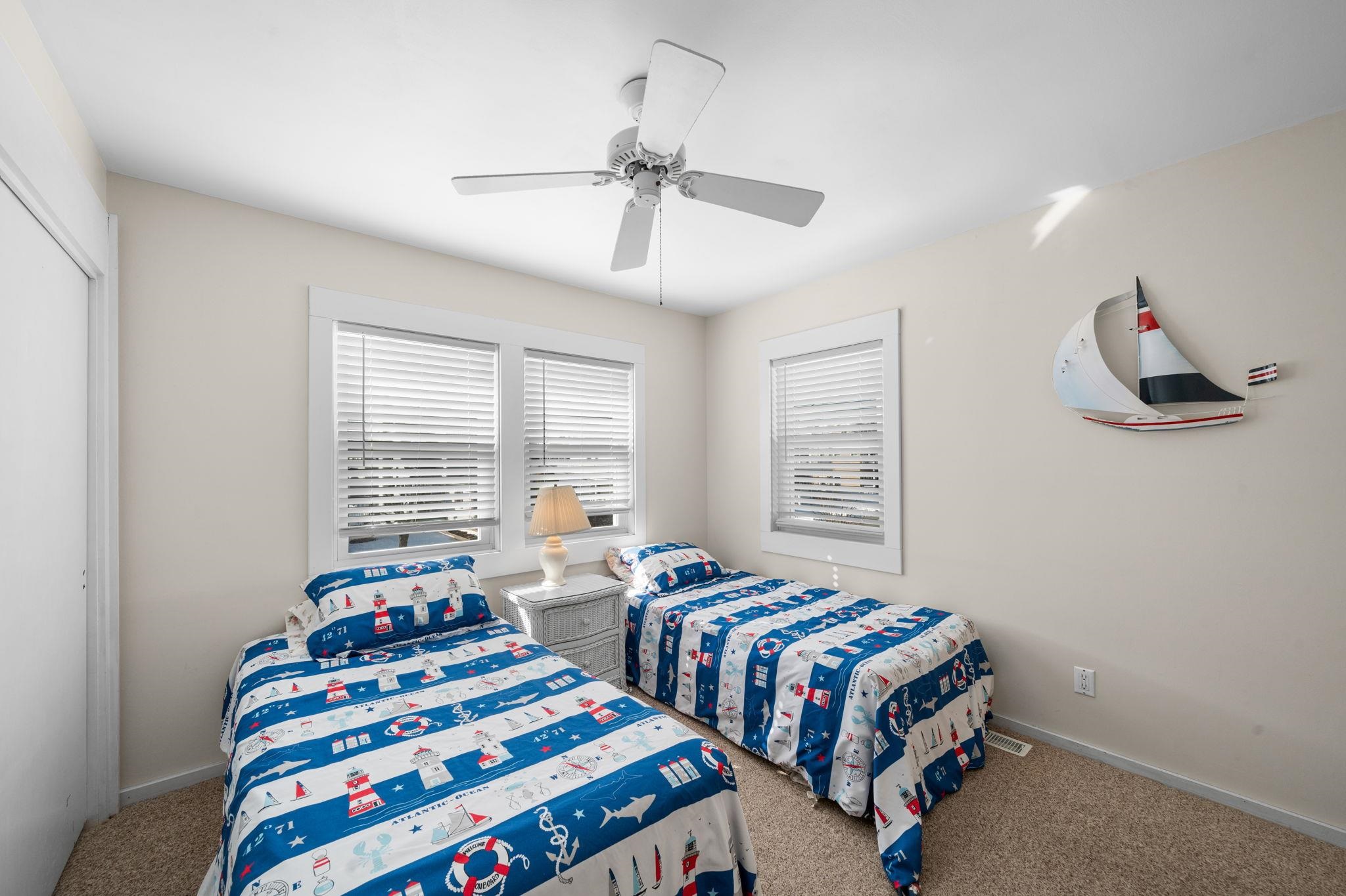 45 19th Street Avalon, NJ 08202 - Photo 34 of 50 a bedroom with two beds and windows