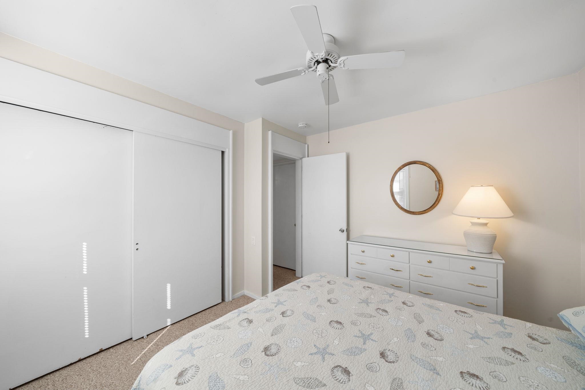 45 19th Street Avalon, NJ 08202 - Photo 38 of 50 a bedroom with a bed and cabinets