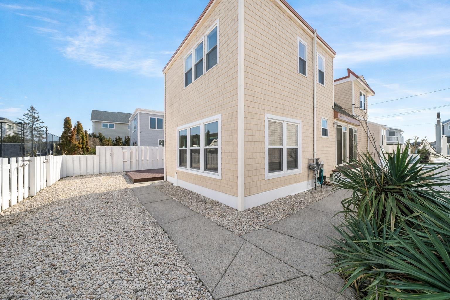 45 19th Street Avalon, NJ 08202 - Photo 41 of 50 a view of a house with a yard