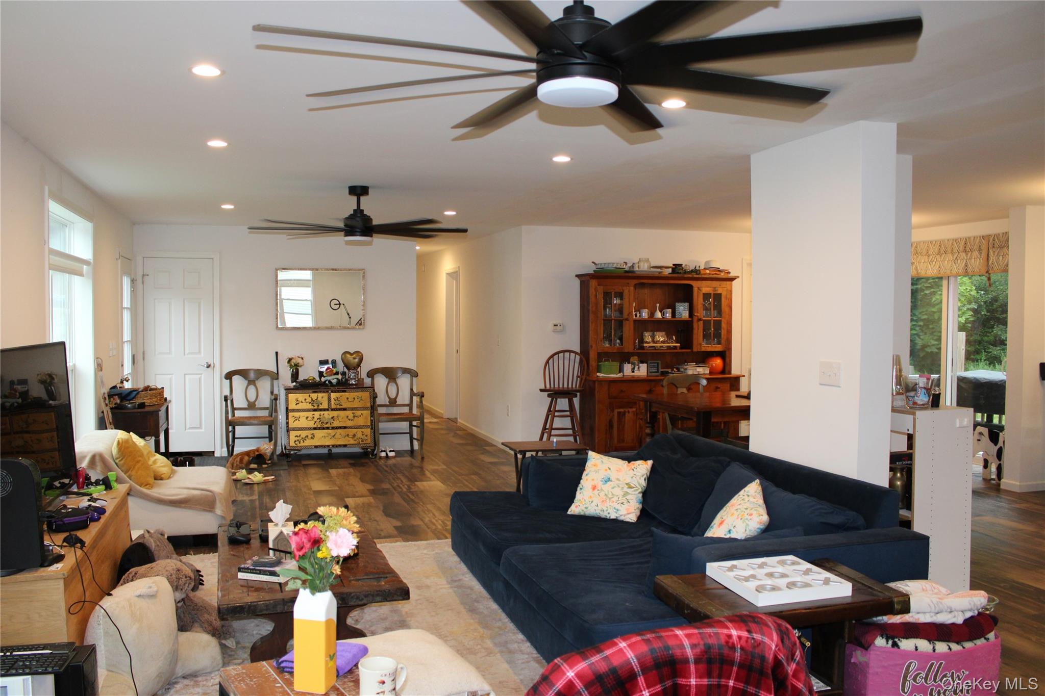 155 Metzger Road Red Hook, NY 12571 - Photo 14 of 29 Living room with plenty of natural light, wood finished floors, recessed lighting, and ceiling fan