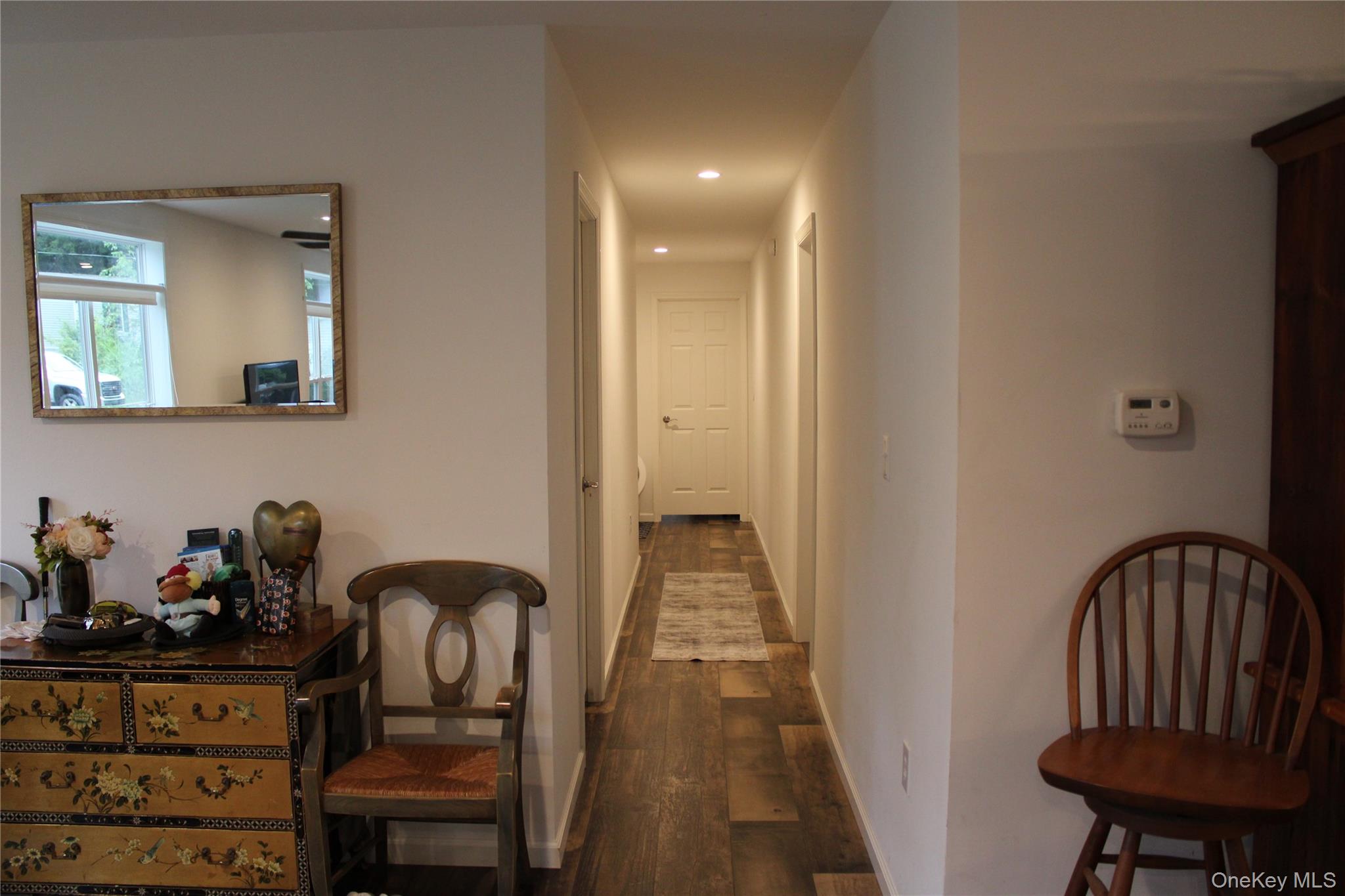 155 Metzger Road Red Hook, NY 12571 - Photo 15 of 29 Hallway featuring dark wood-type flooring and recessed lighting