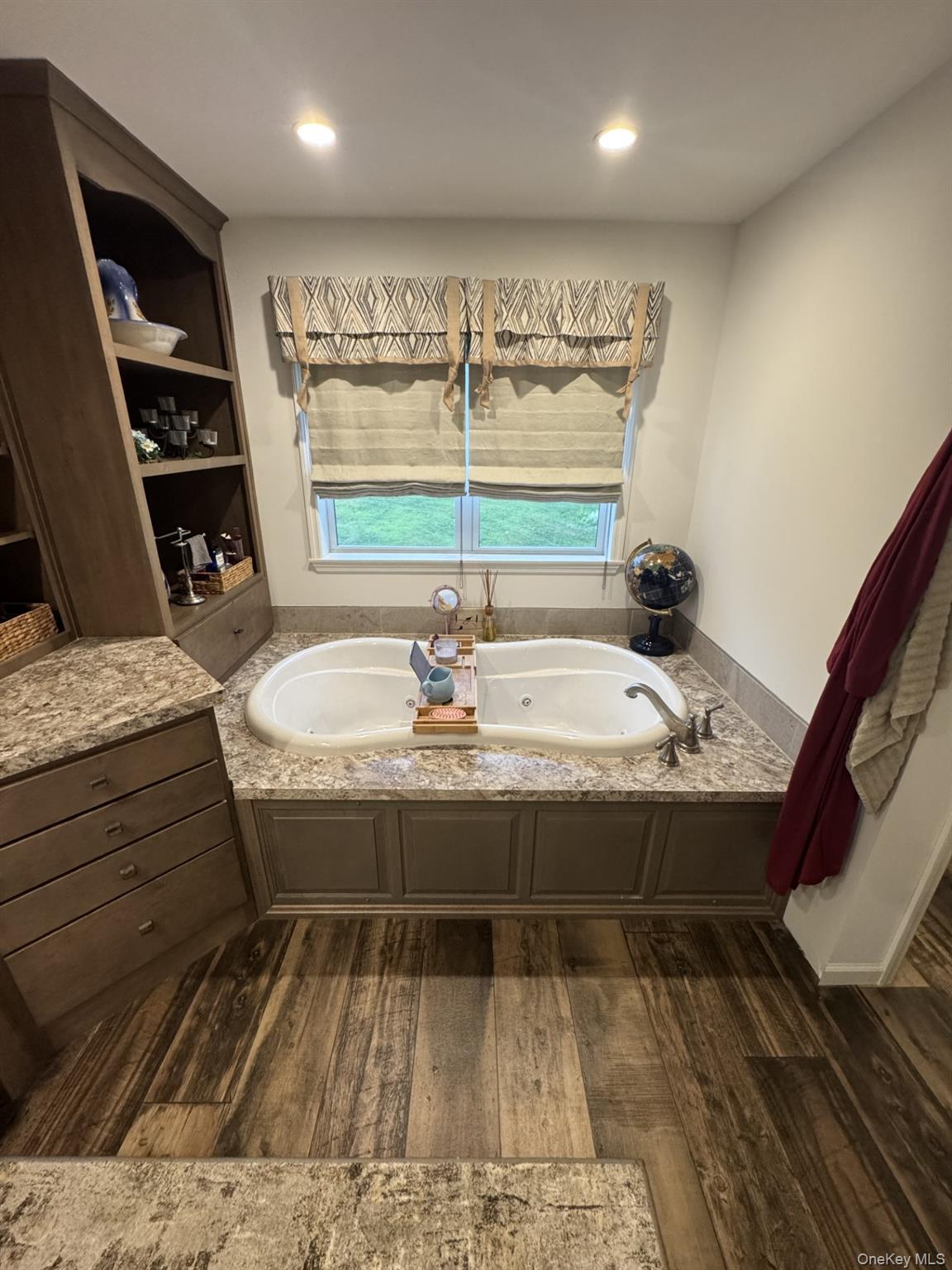 155 Metzger Road Red Hook, NY 12571 - Photo 23 of 29 Full bath featuring dark wood-style floors, healthy amount of natural light, a tub with jets, and recessed lighting