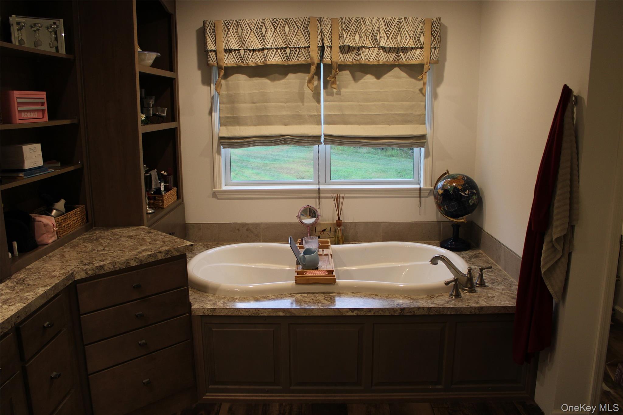 155 Metzger Road Red Hook, NY 12571 - Photo 24 of 29 Bathroom featuring plenty of natural light, a bath, and dark wood-style floors