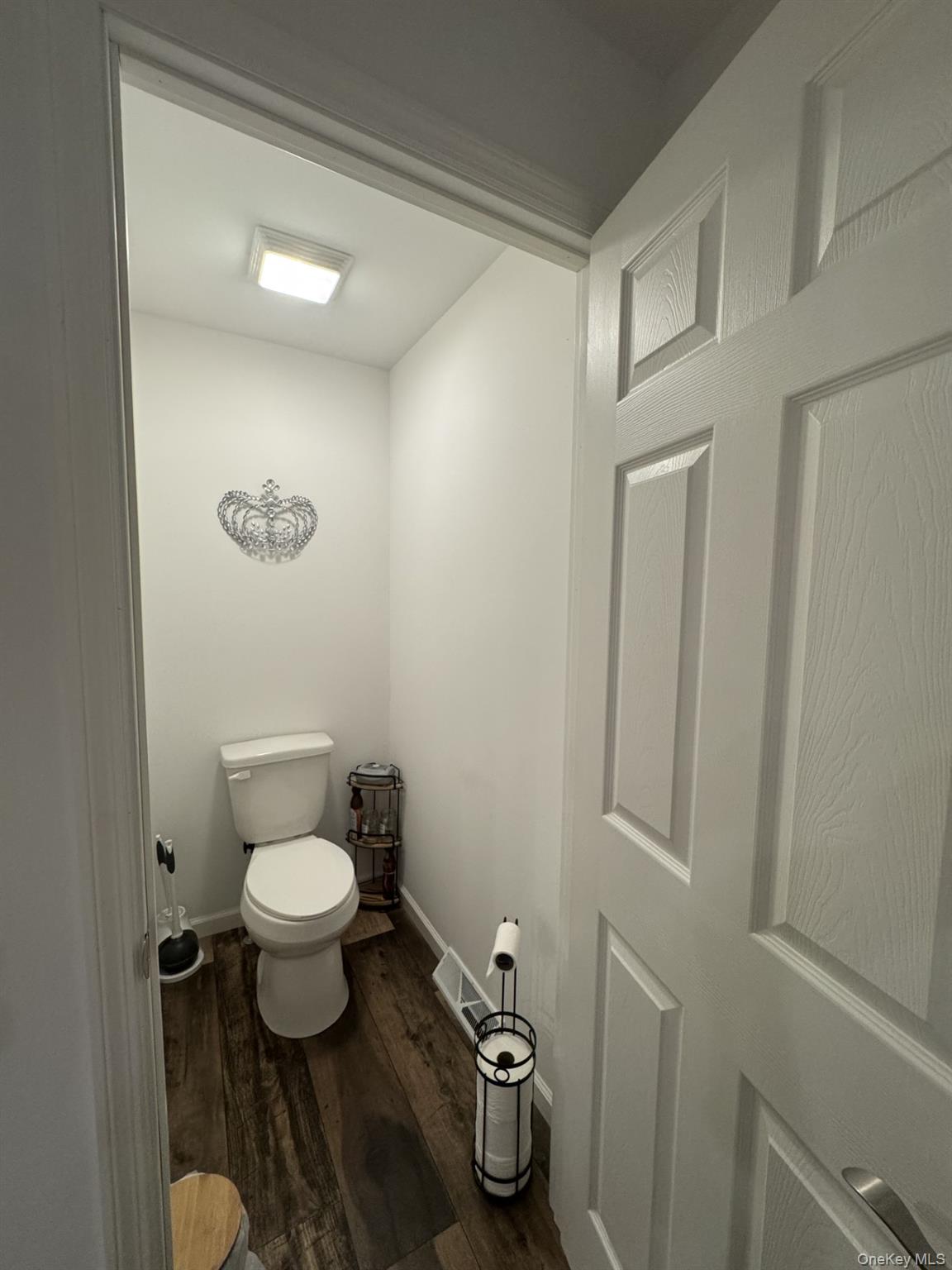 155 Metzger Road Red Hook, NY 12571 - Photo 25 of 29 Bathroom with toilet and dark wood-style flooring