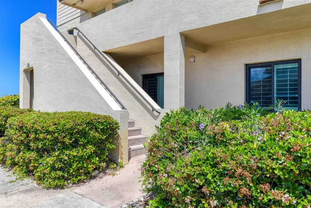 a car parked in front of a house